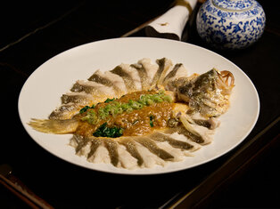 steamed yellow croaker with hairy crab roe sauce by mott 32