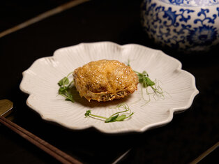 baked stuffed diced fish in hairy crab shell by mott 32