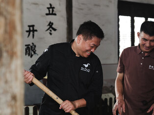 chef having site visit in a chinese yellow wine winery
