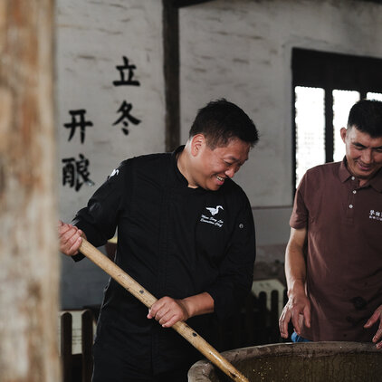 chef having site visit in a chinese yellow wine winery